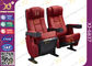 Красные складные стулья посадочных мест театра аудитории использовали задние части кино фильма исправленные местами поставщик